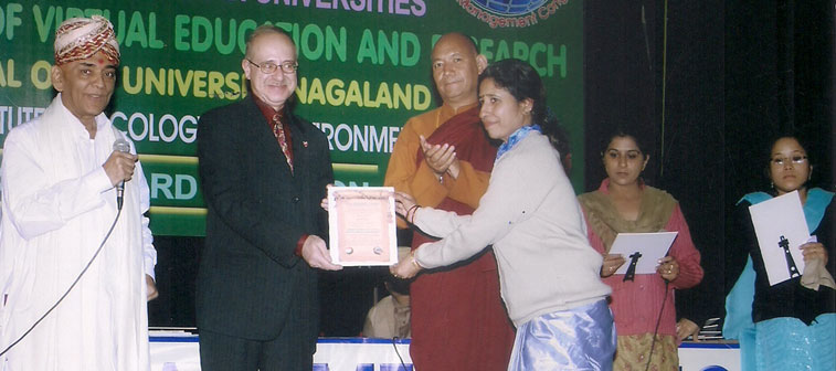 School Principal Receiving Award from University of Nagaland